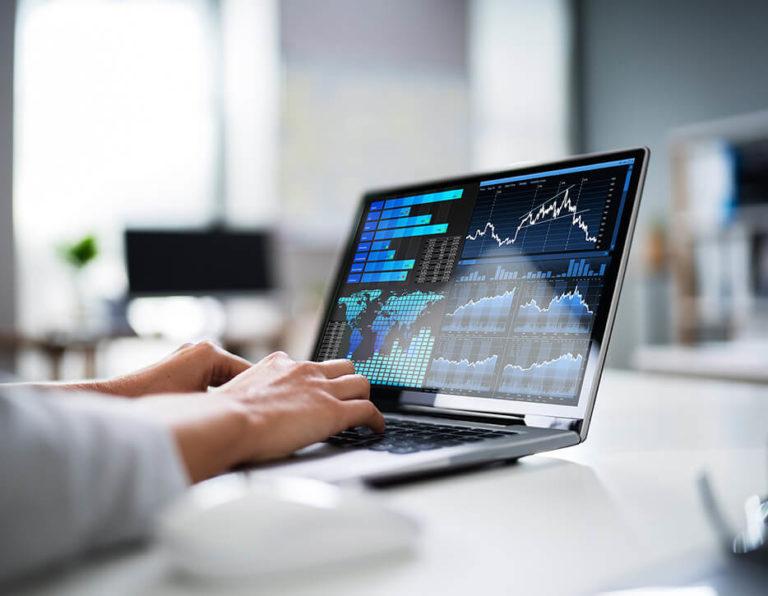 laptop screen with data dashboard